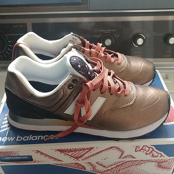 new balance 574 bronze metallic trainers